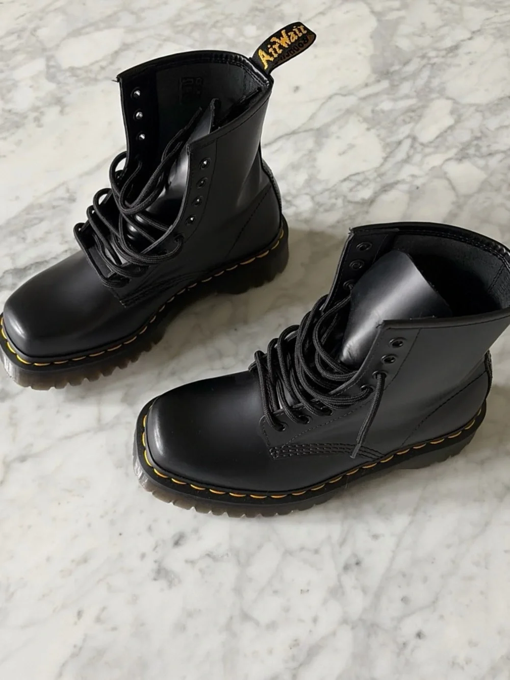 Dr. Martens Black Leather 8-Eye Lace-Up Boots with Yellow Stitching
